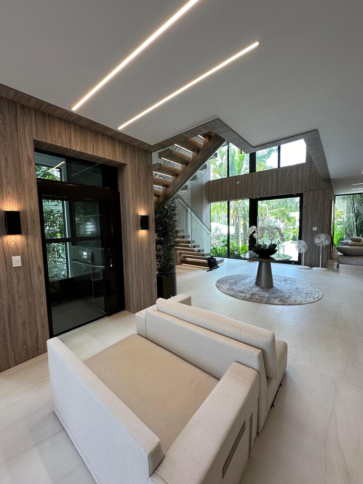 Modern residential interior with integrated linear and architectural lighting