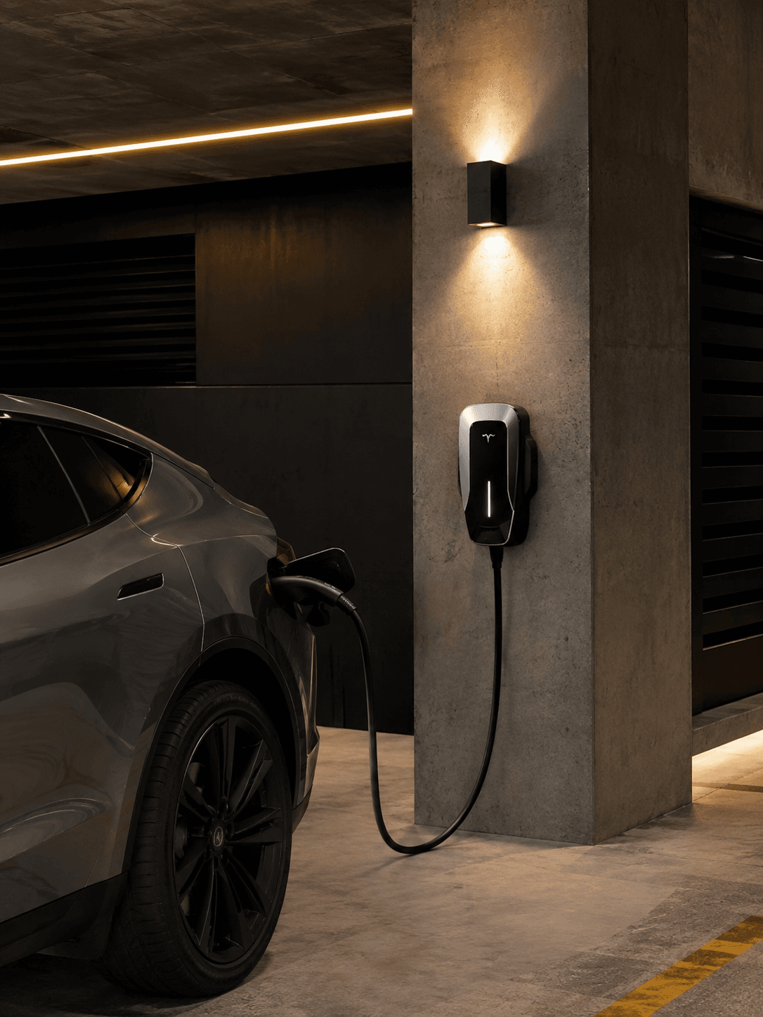 Wall-mounted EV charger installation in a residential garage