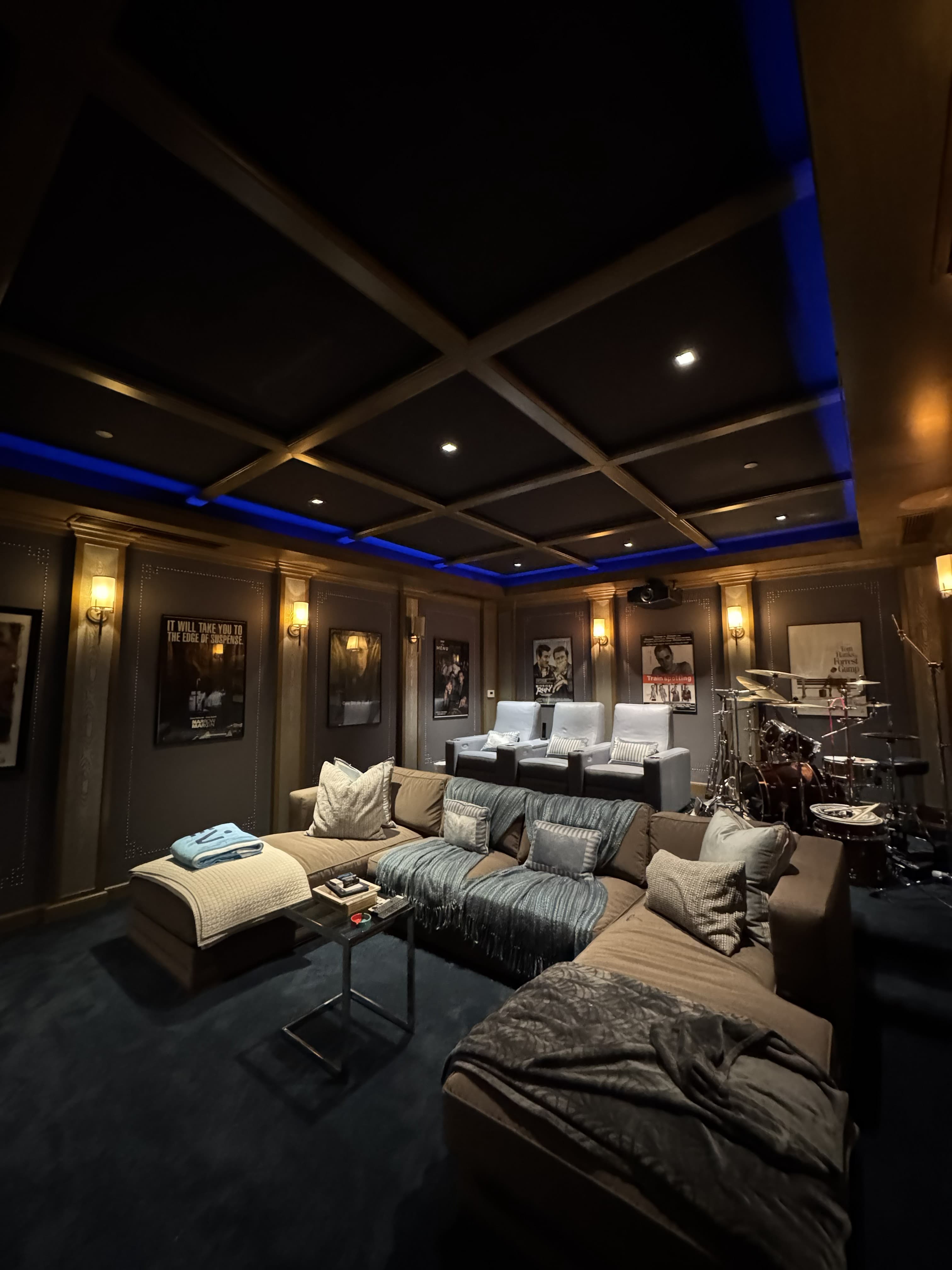 Architectural and accent lighting installation in a custom home theater